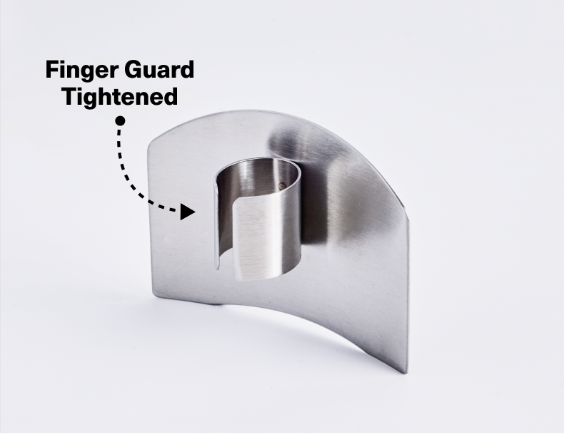 A close-up of a stainless steel finger guard, shown at an angle against a white background. A dashed line with an arrow points to the finger ring portion, which is secured or "Tightened." The text "Finger Guard Tightened" is visible in the upper left corner.