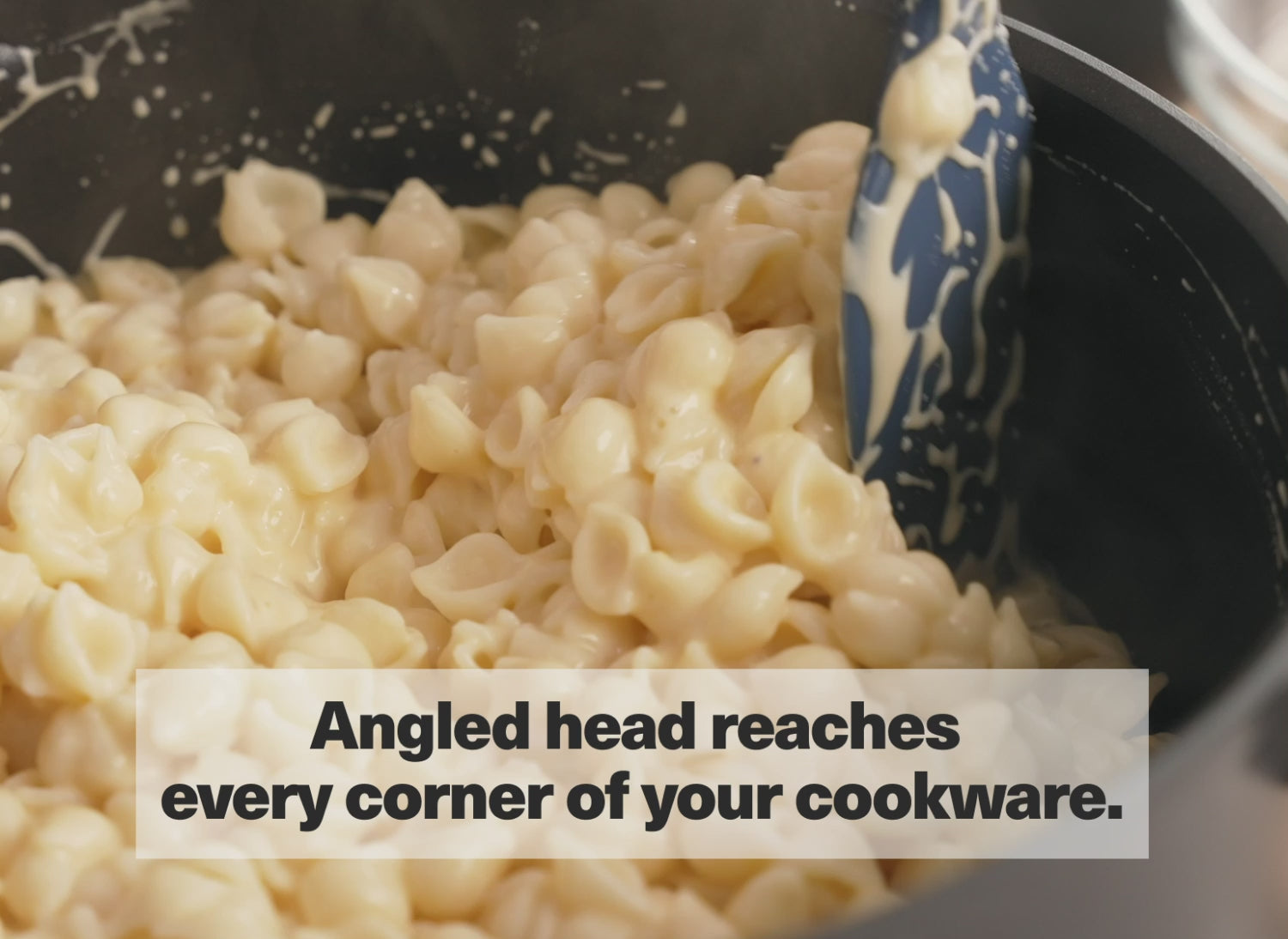 Angled head reaches every corner of your cookware.