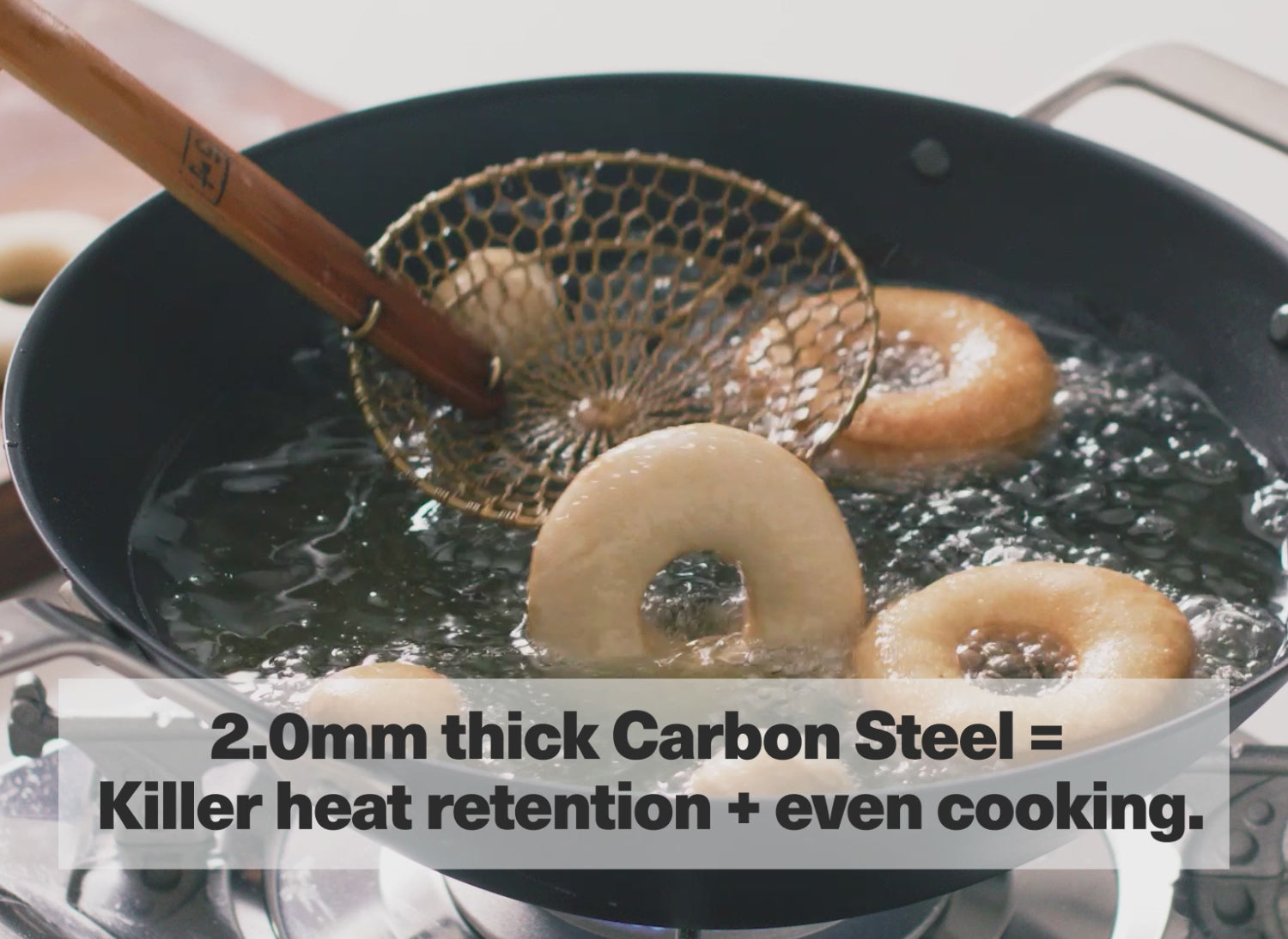 2.0 mm thick Carbon Steel = Killer heat retention + even cooking.