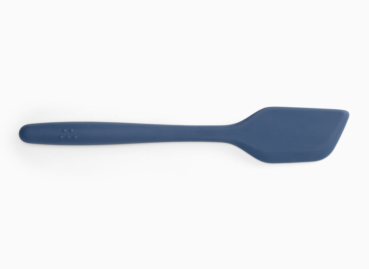 A Blue Misen Mixing Spatula on a white background.